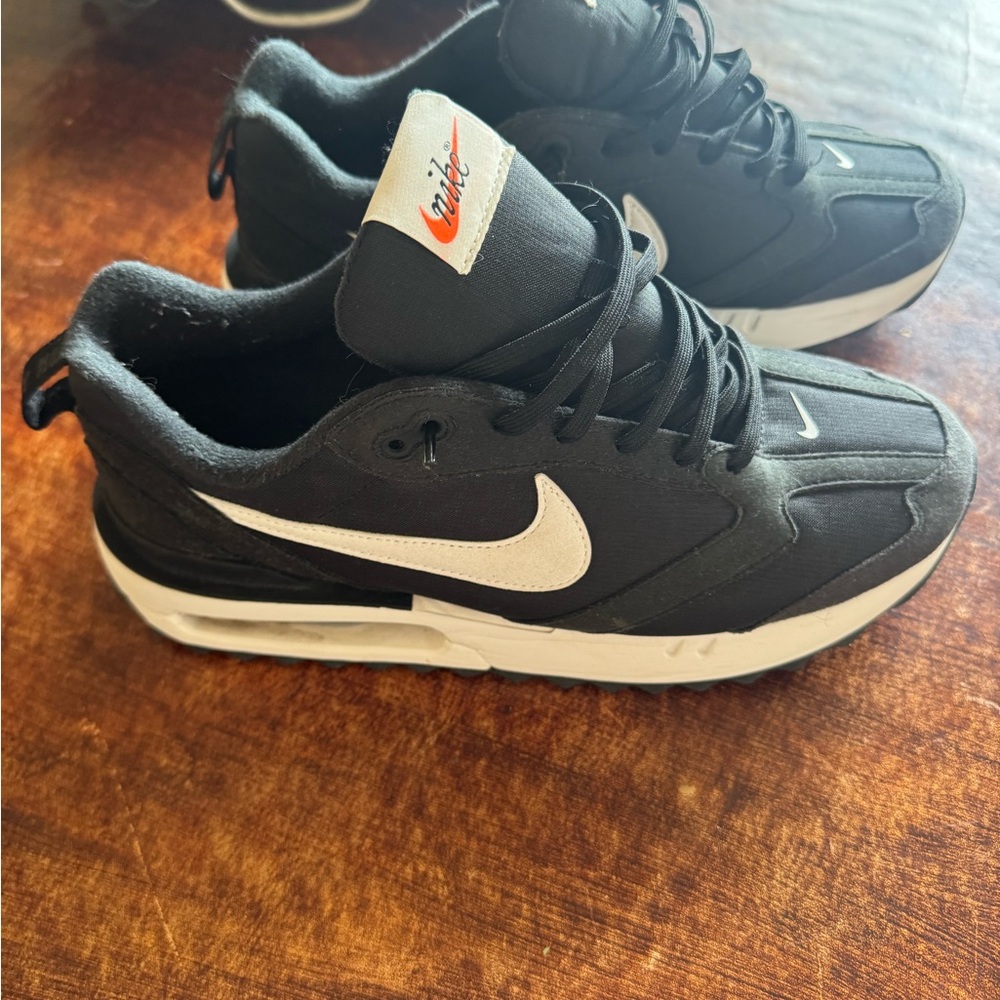 Nike Black and White Low-Top Swoosh Sneakers